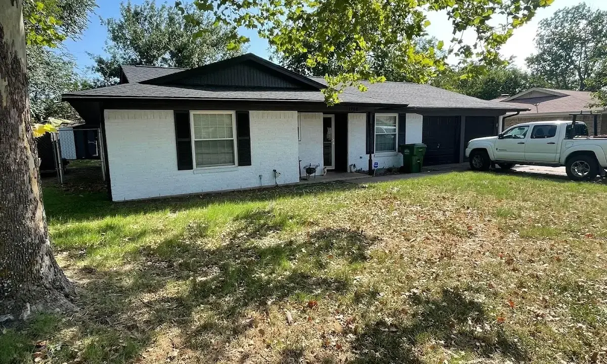 Professional roofing crew working on a residential roof in Bear Valley Springs